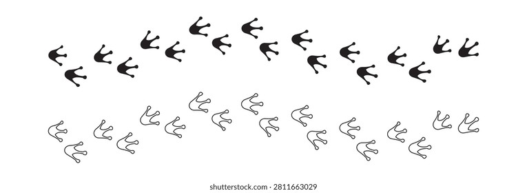 Footprints of a small avian creature imprinted on a sandy surface casting subtle shadow. Ideal for wildlife documentation and nature projects.