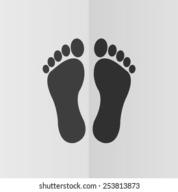 Footprints vector icon. Effect of folded paper. Flat design