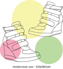 Footwear for women with colored bubbles background - wedge booties. Objects, fashion, isolated