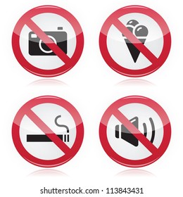 Forbidden sign: no cameras, no food, no smoking, no noise