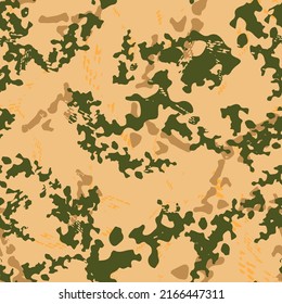 Forest camouflage of various shades of beige, brown and green colors. It is a colorful seamless pattern that can be used as a camo print for clothing and background and backdrop or computer wallpaper