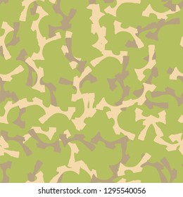 Forest camouflage of various shades of green, beige and brown colors. It is a colorful seamless pattern that can be used as a camo print for clothing and background and backdrop or computer wallpaper