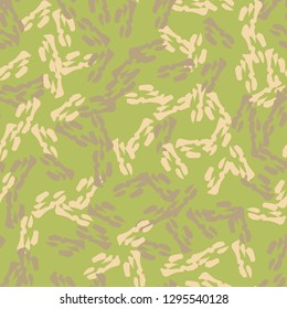 Forest camouflage of various shades of green, beige and brown colors. It is a colorful seamless pattern that can be used as a camo print for clothing and background and backdrop or computer wallpaper