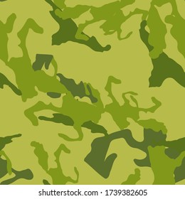 Forest camouflage of various shades of green and grey colors. It is a colorful seamless pattern that can be used as a camo print for clothing and background and backdrop or computer wallpaper