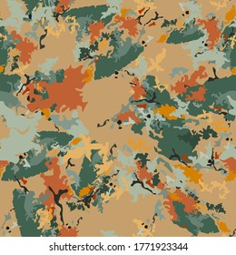 Forest camouflage of various shades of green, brown and orange colors. It is a colorful seamless pattern that can be used as a camo print for clothing and background and backdrop or computer wallpaper