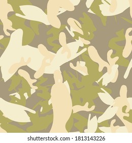 Forest camouflage of various shades of green, beige and brown colors. It is a colorful seamless pattern that can be used as a camo print for clothing and background and backdrop or computer wallpaper