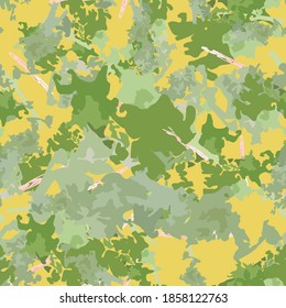 Forest camouflage of various shades of green, beige and yellow colors. It is a colorful seamless pattern that can be used as a camo print for clothing and background and backdrop or computer wallpaper