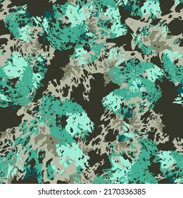 Forest camouflage of various shades of green and grey colors. It is a colorful seamless pattern that can be used as a camo print for clothing and background and backdrop or computer wallpaper