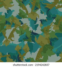 Forest camouflage of various shades of green and grey colors. It is a colorful seamless pattern that can be used as a camo print for clothing and background and backdrop or computer wallpaper