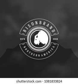 Forest camping logo design vector illustration. Outdoor adventure leisure, Bison silhouette print stamp. Vintage typography badge template.