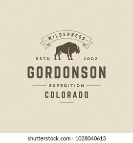 Forest camping logo emblem vector illustration. Outdoor adventure leisure, Bison silhouette print stamp. Vintage typography badge design.