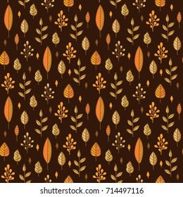 Forest leaves sweet seamless vector pattern. Botanic background in colors of brown, yellow and orange. Colorful doodle texture for print design