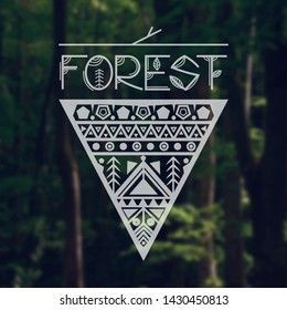 Forest logo on a blurred background