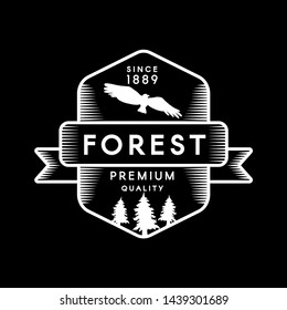 Forest negative space logo. Reserve park logotype template. Pine trees and flying eagle silhouette
