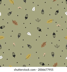 Forest plants acorns and leaves seamless pattern on green background. Baby cartoon vector illustration in  Scandinavian style. 