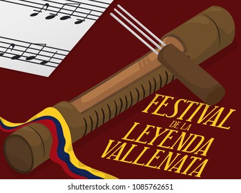Fork and guacharaca with Colombian ribbon and vallenato stave ready to perform in the contest for Vallenato Legend Festival (written in Spanish).
