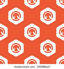 Fork and knife lying on plate in white hexagon, repeated on orange background