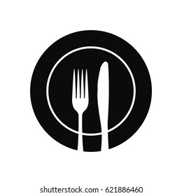 Fork and knife on a plate icon vector