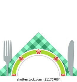 Fork, knife and plate on a green napkin. Composition on a white background.