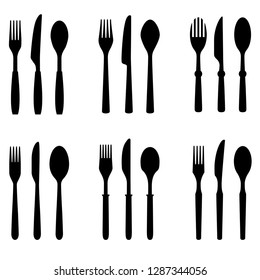 Fork, knife and spoon silhouettes.