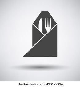 Fork and knife wrapped napkin icon on gray background with round shadow. Vector illustration.