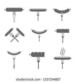 Fork with sausage icons. BBQ ana barbecue concept symbol set Vector