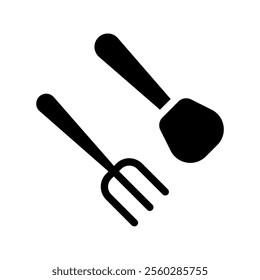 Fork and Spatula. Concept of cooking, kitchenware, and culinary.