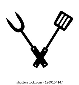 fork and spatula utensils on white background