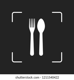 Fork and spoon, icon. Kitchen tools. White object in camera autofocus on dark background