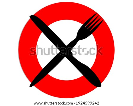 Fork and spoon on a red plate, a sign of diet or or dietary restrictions.