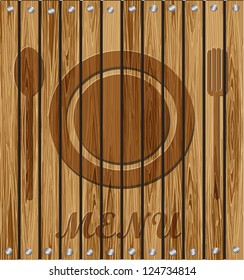 Fork, spoon, plate - a restaurant menu on a wooden background