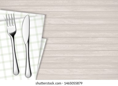 Fork and table knife on a napkin. Wooden table. Vector illustration.
