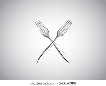 Forks crossed, isolated on white background