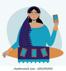 A fortune teller of the future reads tarot cards. Vector image of a woman who is engaged in magic. The witch conducts an isotheric session.