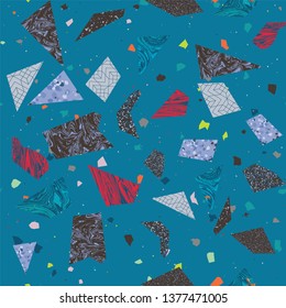 Found fragments seamless vector repeat pattern.  Includes elements of marble and terrazzo and patterned pieces.  Speckled stone mosaic collage.  On teal blue.