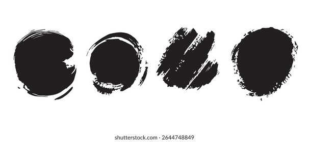 Quatro manchas de tinta preta abstratas sobre fundo branco.