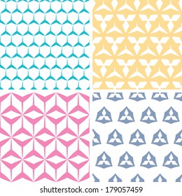 Four abstract geraldic geometric pink seamless patterns set