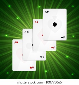 Four aces on green background