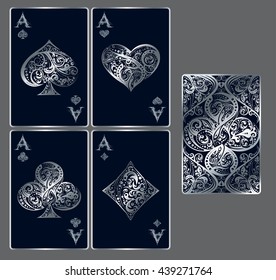 Four aces. Set of vector playing card suits and back design made by floral elements. Vintage stylized illustration in silver colors on black background. Works well as print, icon, emblem, symbol