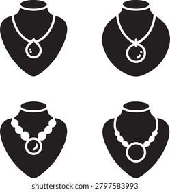 Four black of necklaces on display stands, featuring different pendant shapes and bead styles desi