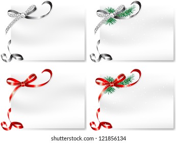 Four blank cards with silver and red bows