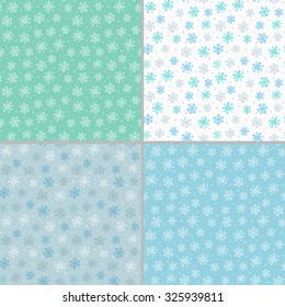 Four blue, white and grey seamless patterns with snowflakes. Can be used for wallpaper, pattern fills, textile, web page background, surface textures