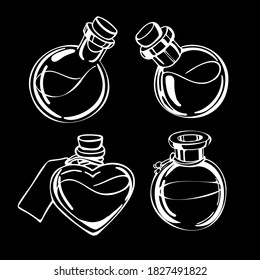 
four bottles on the black background