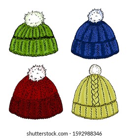 Four bright colored woolen knit hats.