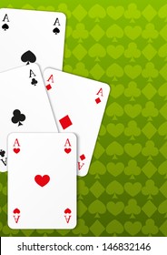 Four cards on green background