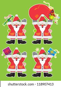 Four cheerful Santa Clauses with sweets and presents