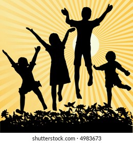 Four children jumping with sun and rays as background