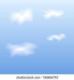 four clouds against the sky