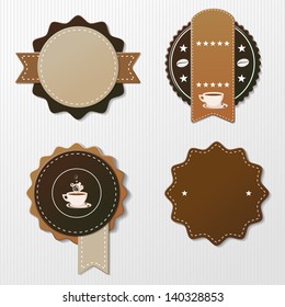 Four coffee labels with text.