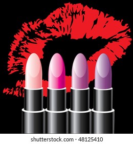  four colored lipsticks on the background of a print lips